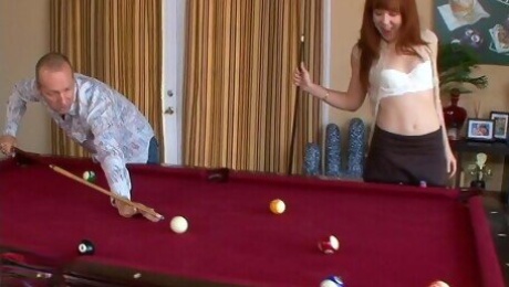Naughty redhead chick Trinity Post gets fucked hard on the pool table