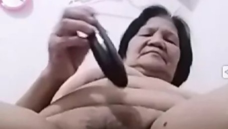 My 67yo Filipina granny gf uses an eggplant as a dildo, part 3